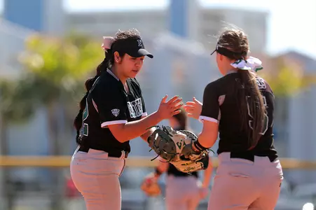 Nikki and Olivia at the mound