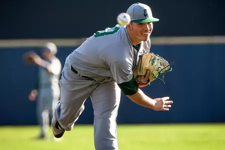 Luke McGuire (10) pitching
