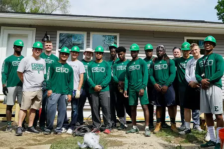 EMU Football Helps Habitat for Humanity