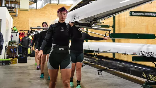 McCaslin unloading a boat at the boathouse