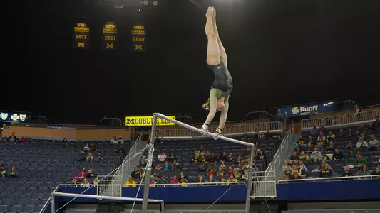 Freshman Kyrie Lowe Leads The Eagles on Bars at Michigan Exhibition