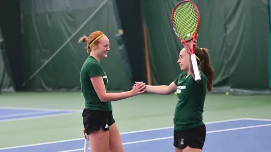 Luisa Pelayo and Grace Whitney action shot