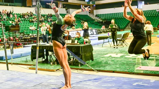 Anna Grace McCullough Bars Action Shot vs. NIU