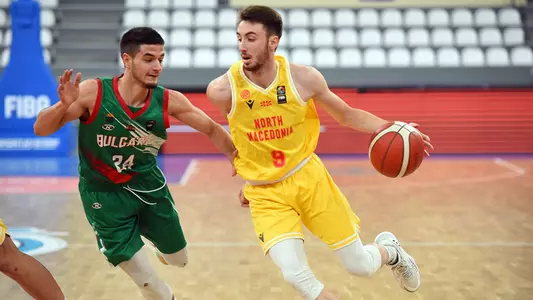 Luka Savicevic in action for North Macedonia against Bulgaria at the 2022 FIBA European U20 Championships, Division B Tournament
