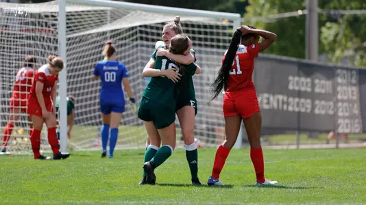 Meagan Lukowski and Maddie O'Farrell hug after goal at Illinois State