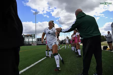 Ashley Schneider pre game huddle 2022