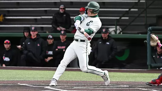 Matt Kirk connects on a pitch against Ball State, Friday, March 24 in Ypsilanti, Mich.