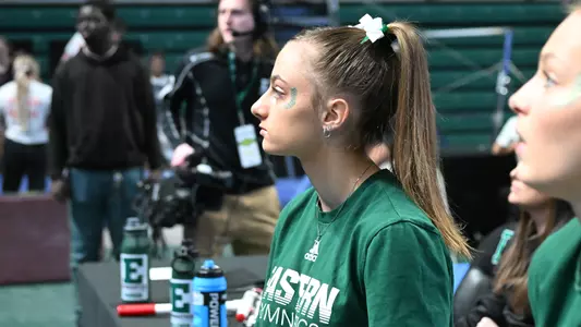 Gianna Antonio watches vault warmups