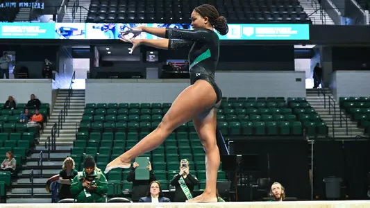 Ari Harris performing beam exhibition on Senior Day (4)