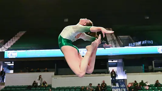 Cassie Bergin jumps during beam routine against Ball State