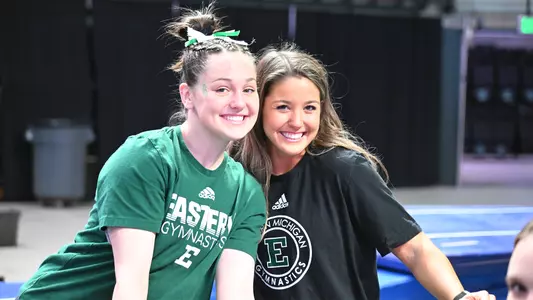 Cali Harden and Cassie Bergin smile for camera at BGSU meet