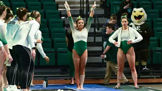 Emma Lewis preparing to vault against Ball State