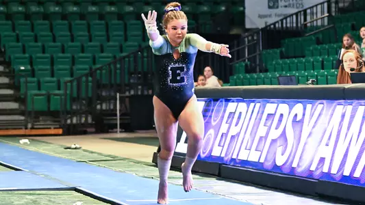 Emma Lewis running down vault track against Kent State