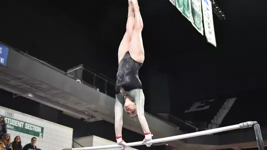 Hannah Hartung handstand on bars against Kent State
