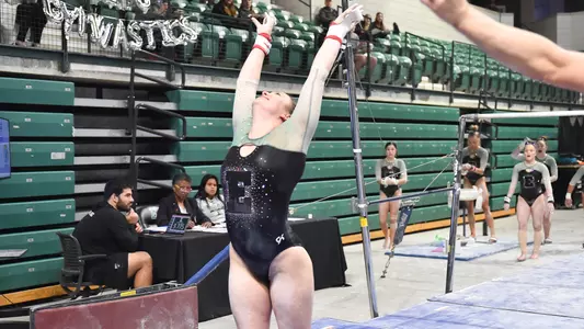 Hannah Hartung bars dismount against Kent State