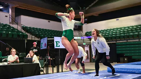 Molly Parris celebrates vault routine against Ball State