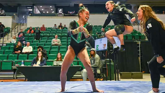 Molly Parris celebrates vault routine against BGSU