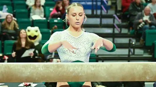 Mick Stuckey before her beam routine against Ball State