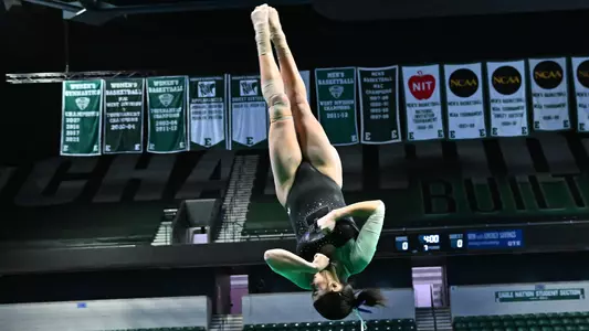 Trinity Macy twists during tumbling pass on floor against Kent State