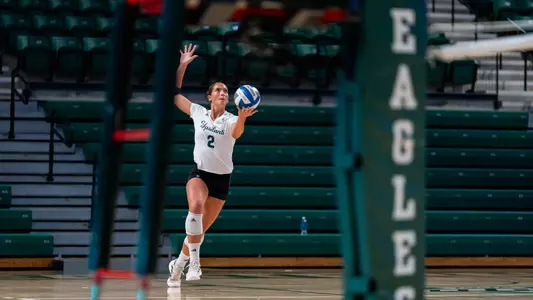 Anna Guard serves against Western Michigan, Oct. 17, 2024