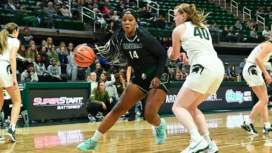 Sisi Eleko drives to the basket at Michigan State