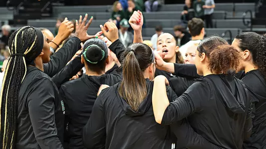 Team group huddle WBB 2024-25