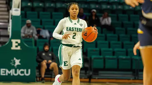 Nia Boston bringing ball up court