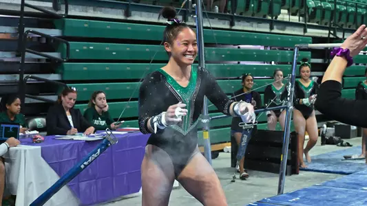 Molly Parris Smiling after sticking bars
