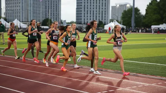Esme Davies and Sofia Ivanko run in the 10,000m run at the 2024 MAC Outdoor Championships, May 9, 2024