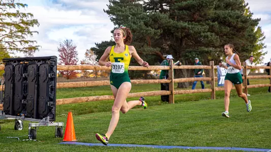 Marta Moreno crosses the finish line at the MAC Cross Country Championships, Oct. 28, 2023