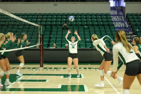 Ella Voorhees sets the ball in a Green vs. White scrimmage, Aug. 24.