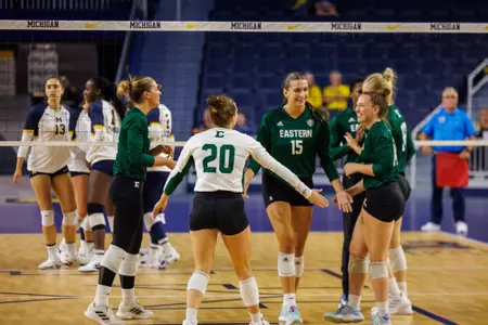 Volleyball celebrates a point at Michigan, Sept. 4, 2024