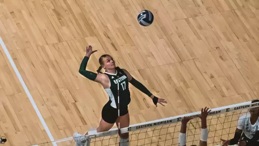 Taeley Mahler Preparing to Hit a Volleyball With Her Right Hand Against Kent State, Oct. 10, 2025