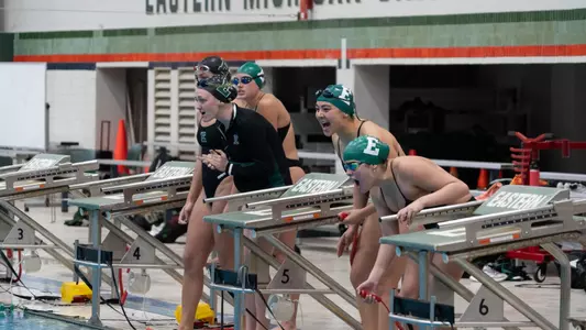Shayne Patrick, Ali Kudo, and Nicole Shanks cheering on a race