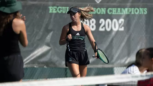 Regina Mendez pumps her fist after winning a point at the Block E Invitational