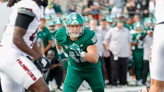 Andrew Marshall rushed the quarterback in the game with NIU, Oct. 11