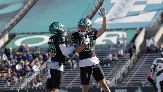 Nick Devereaux celebrates the first of his two touchdowns against Ohio, Oct. 25, in Ypsilanti.