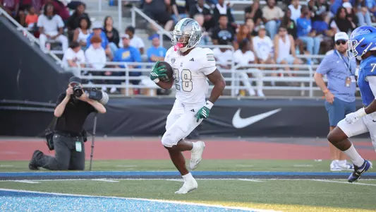 Dontae McMillan runs in one of his two scores at Buffalo