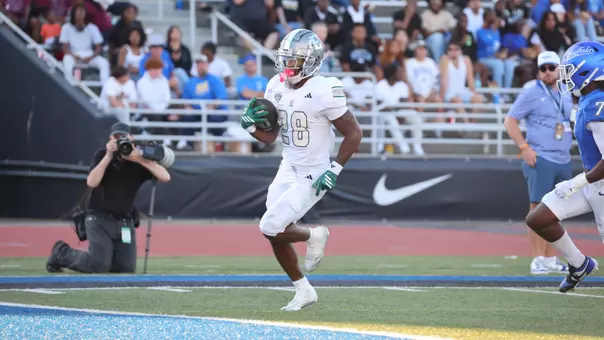 Dontae McMillan runs in one of his two scores at Buffalo