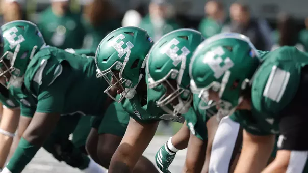 Defensive Line readies for the snap against Northern Illinois' offense