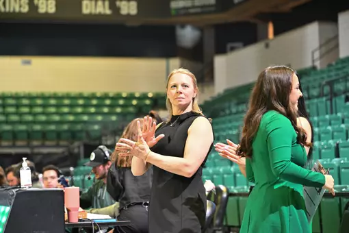 Head Coach Katie Minasola Cheering On Team
