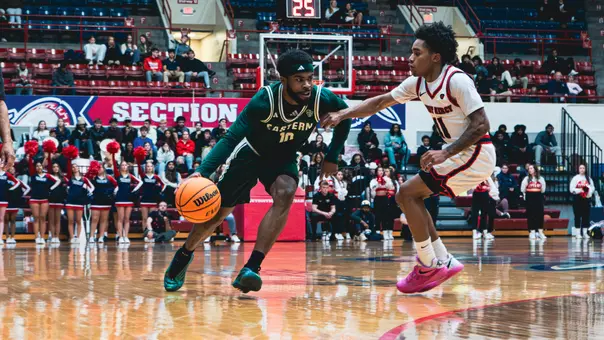 Jon Sanders II dribbling a basketball at Detroit Mercy, Nov. 18