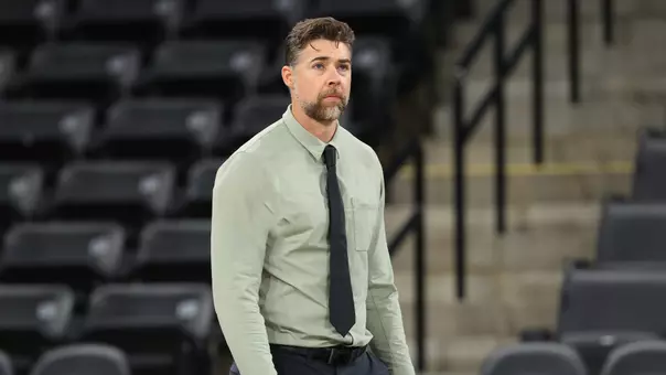 Head Volleyball Coach Kevin Foeman coaches on the sideline against Oakland, Sept. 19, 2025