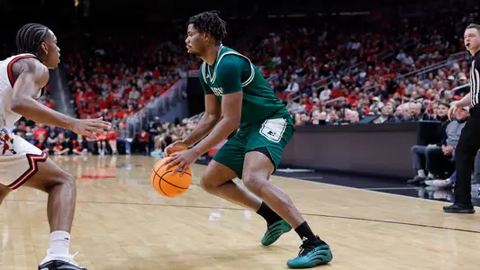 Carlos Hart dribbling a basketball at Louisville, Nov. 24, 2025