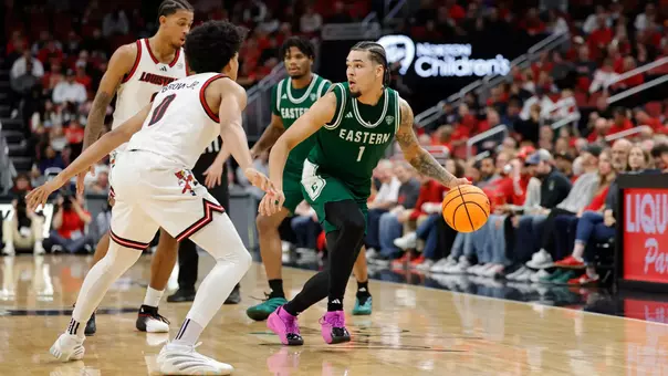 Mak Manciel dribbling a basketball at Louisville, Nov. 24, 2025