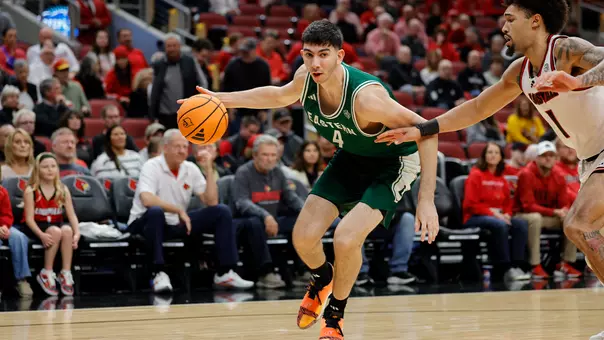 Mo Habhab dribbling a basketball at Louisville, Nov. 24, 2025