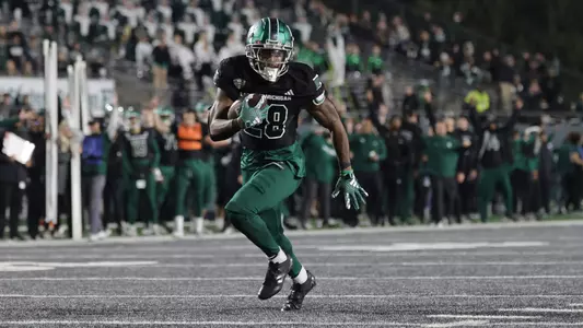 Dontae McMillan runs the ball in for a touchdown against Wester Michigan