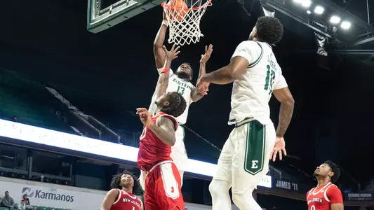 Godslove Nwabude elevating to dunk a basketball against NJIT, Nov. 28, 2025