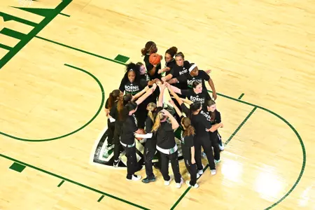 2025-26 women's basketball team huddles pregame against Robert Morris, Nov. 26, 2025