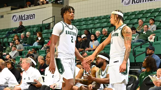 Carlos Hart high fiving another player